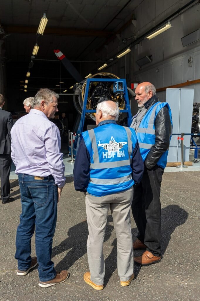 HUFTM volunteers chatting outside the hangar